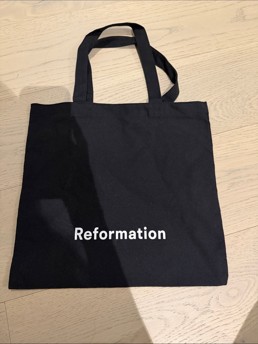 Reformation black canvas logo tote